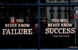 Painted window that says "If you never know failure, you will never know success."